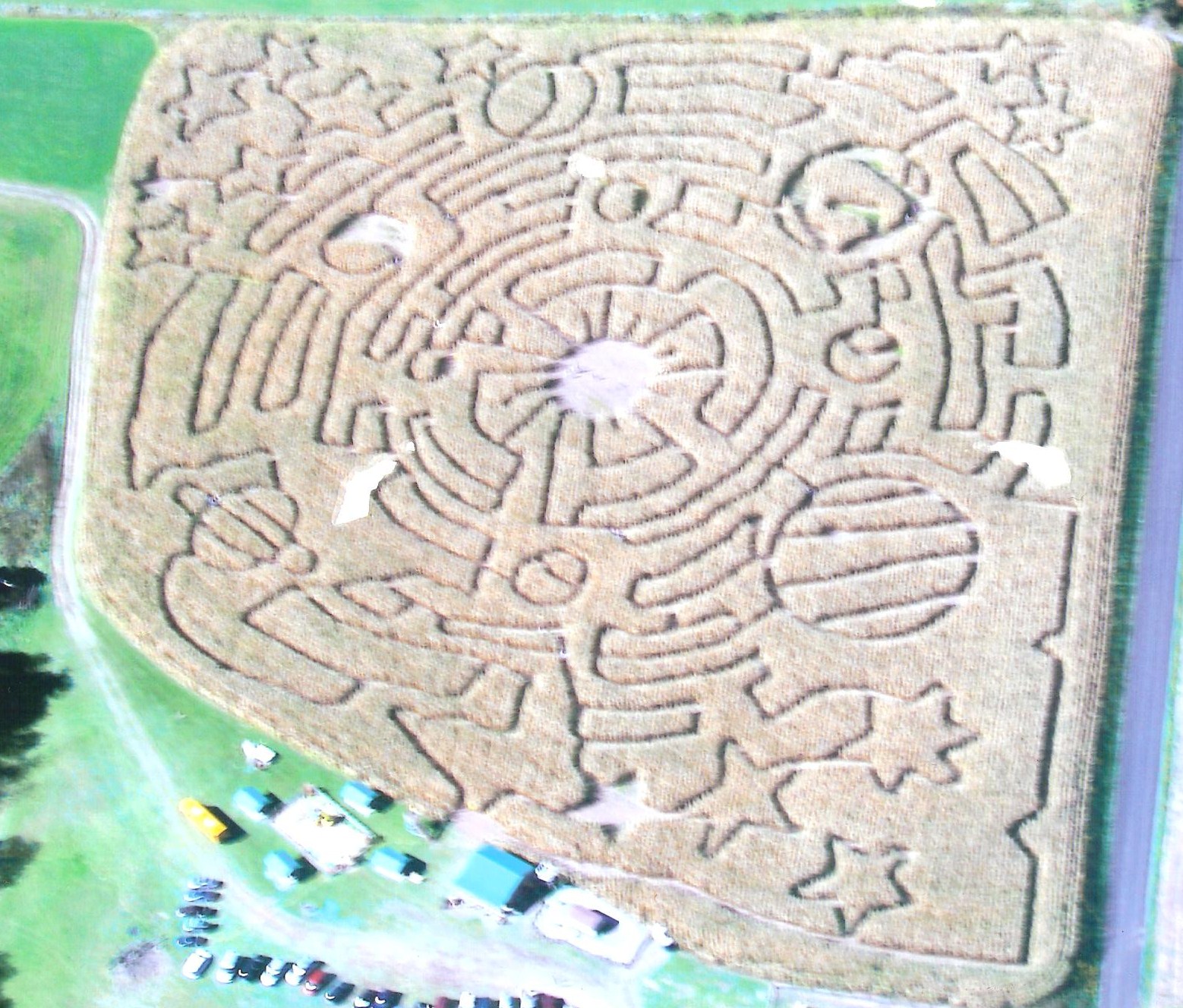 Corn maze design depicting the solar system, stars, and a maze